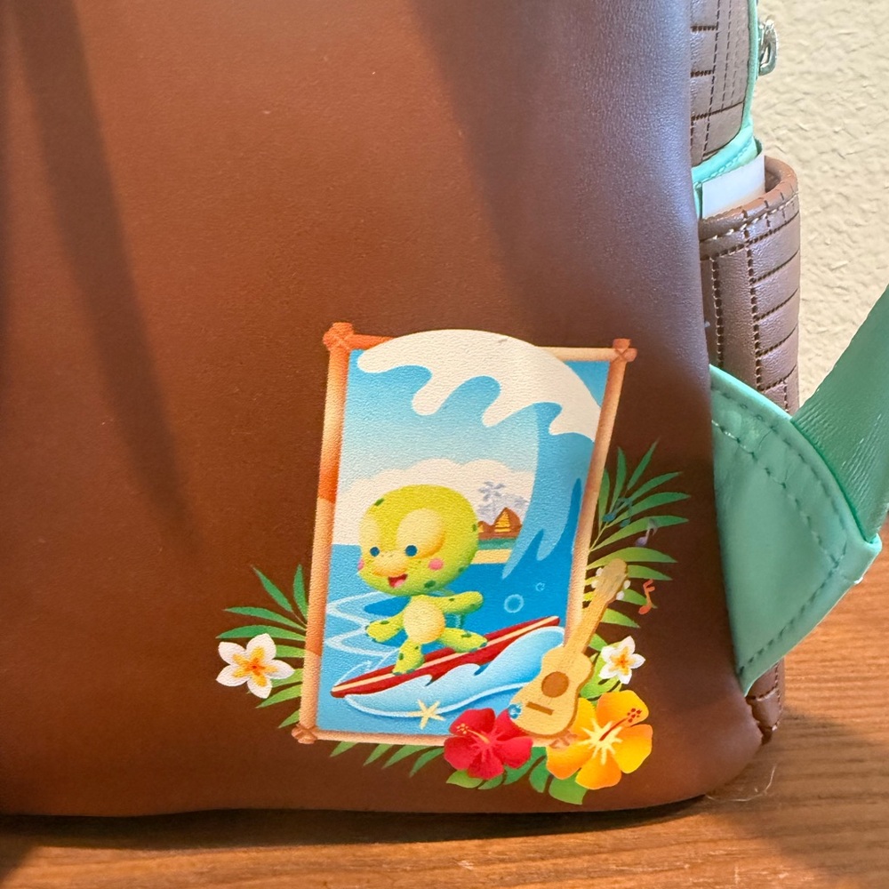 NWT Disney Parks Olu Mel Aulani Resort Loungefly Backpack - Picture 6 of 10